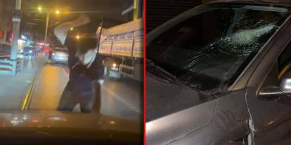 Yol verme tartışması kamerada: Otomobilin camını yumrukla kırdı